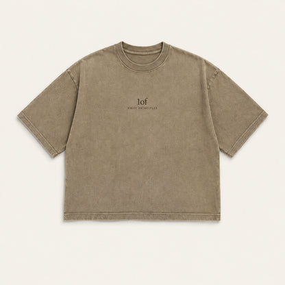 Generated PRACTICE concept: front of a khaki oversized shirt with a small 1of / FIRST PRINCIPLES chest mark.
